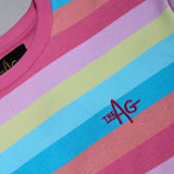 Close-up of a striped crewneck sweatshirt with pastel pink, blue, yellow, and orange bands, featuring a red embroidered 'THE AG' logo on the chest.